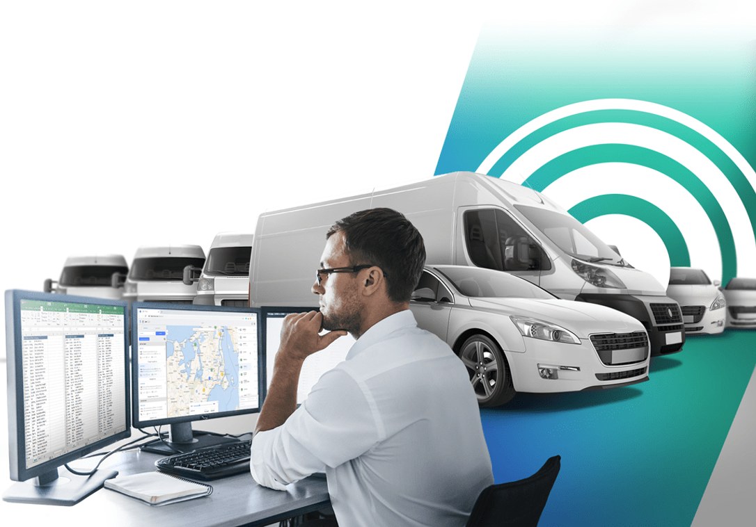 Fleet tracking dashboard on screen showing vehicle locations – Satmo Vehicle Tracking 2025