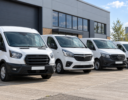 Vehicle tracking for small businesses – four white fleet vans outside business premises